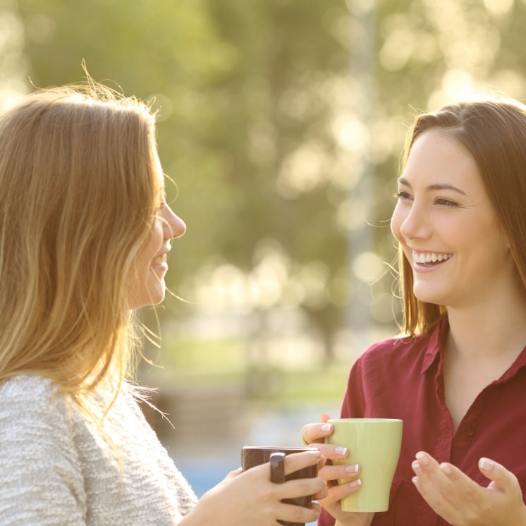 girl having discussion over coffee
