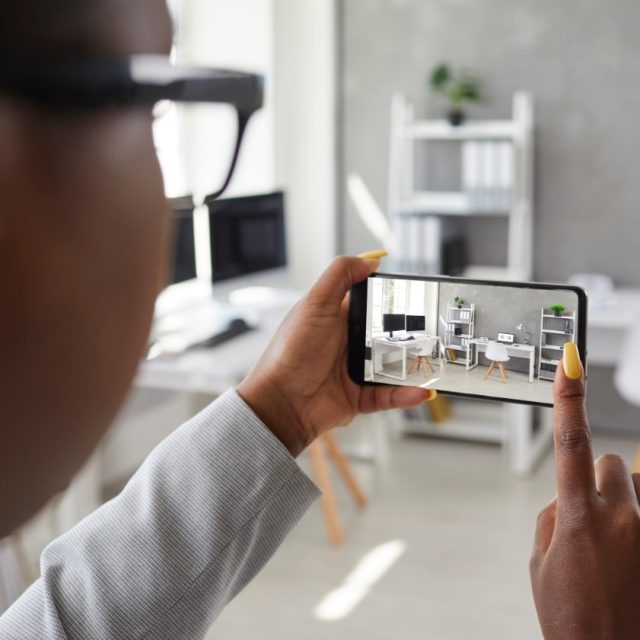 Woman taking picture with smartphone